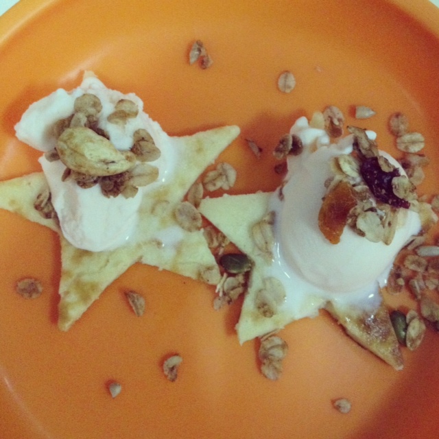 Star pancakes with yogurt ice cream and granola toppings