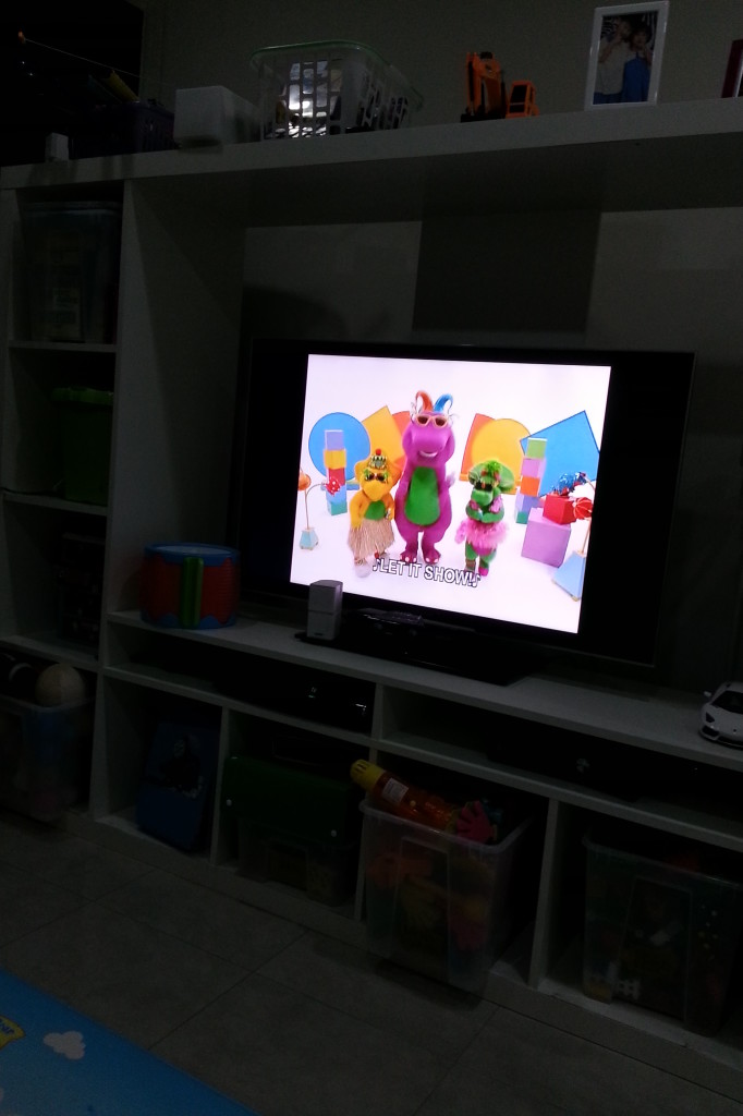 Watching Barney on TV at home!