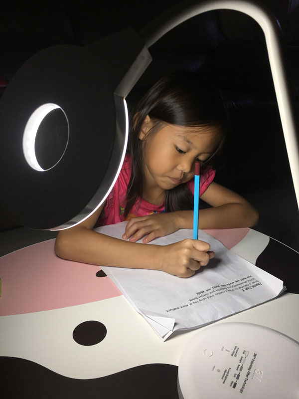 The LED P1610 Polarizing Task Light also gives free angle control. I use it to clean the kids' ears at night too!