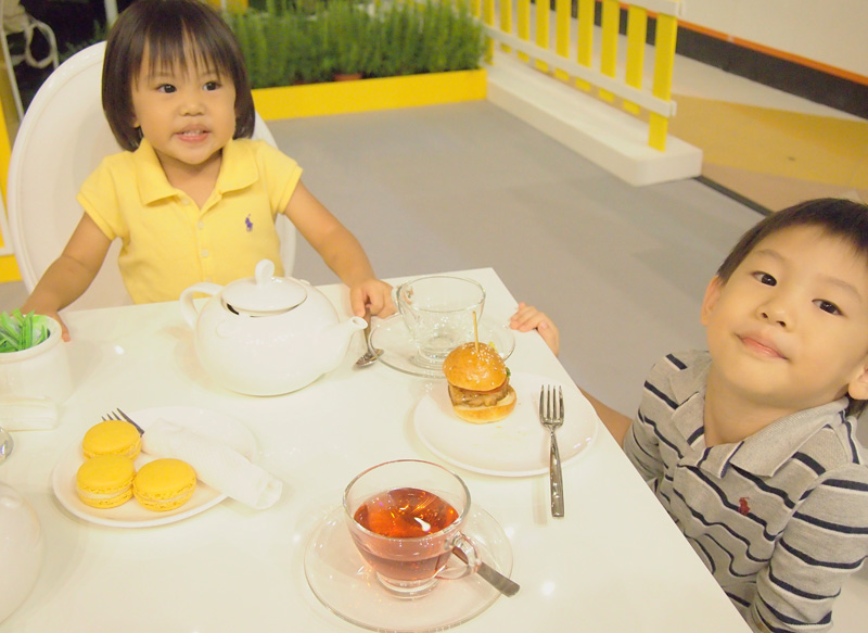 Having tea with sweet and savoury treats