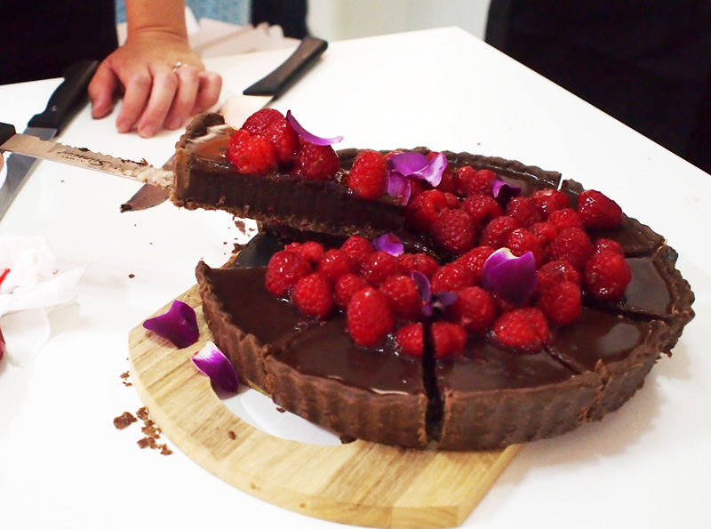 Slicing the tart: our tart was crowned the best BY Judge Audra for its silky smooth, "not grainy" ganache!