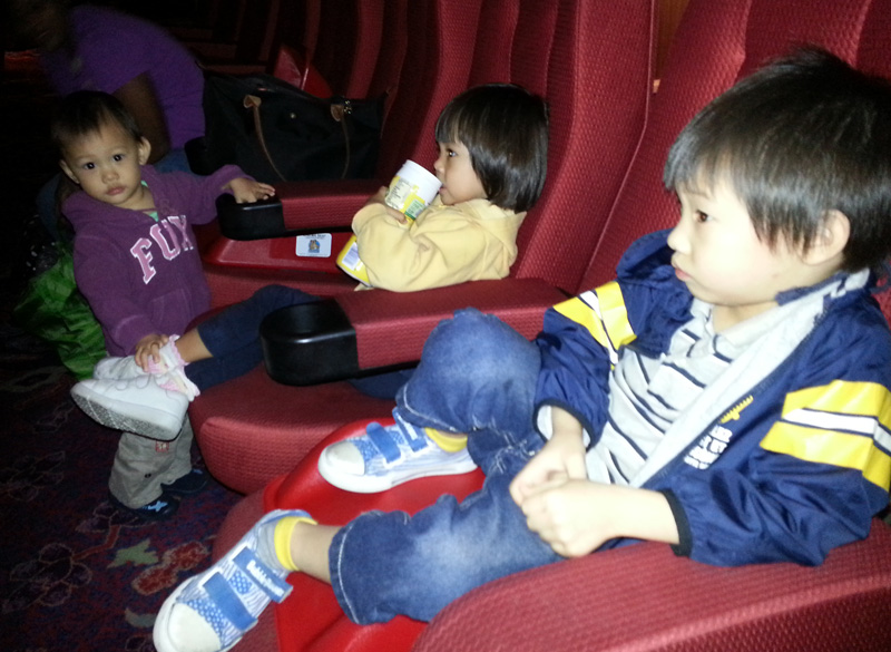 Ben and Becks watching the movie while Nat moved freely around