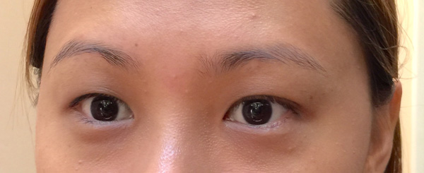 Can you spot the seemingly insignificant: the right arch on the right brow and a little "hole" where there's no hair on the left?
