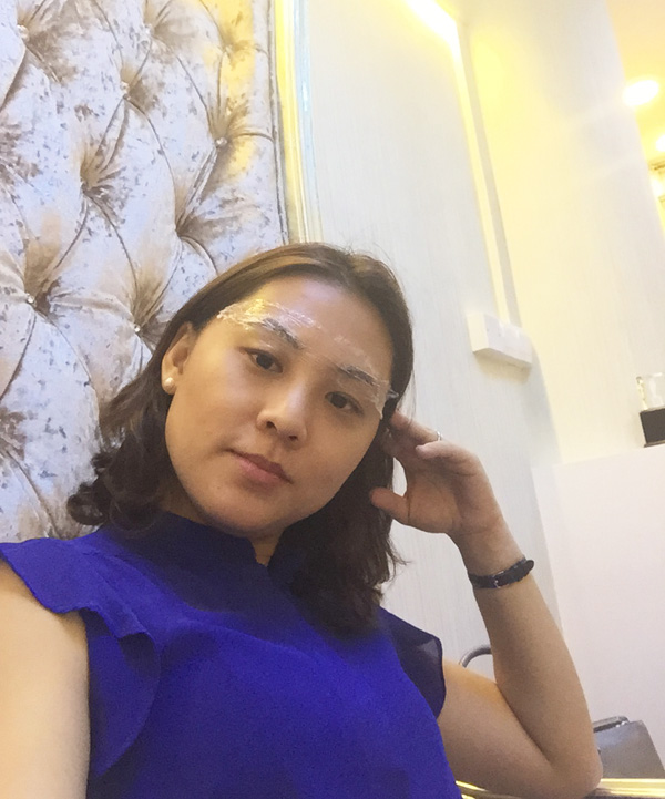 Chilling on the lux couch while waiting for the numbing cream to take effect