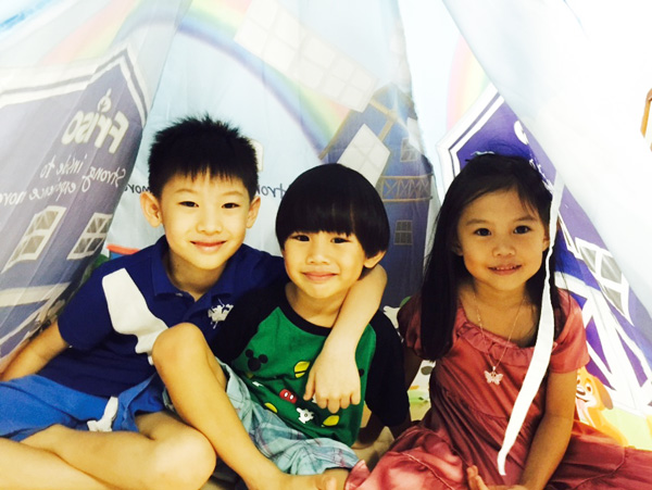 First, the kids tried to fit in the tent...